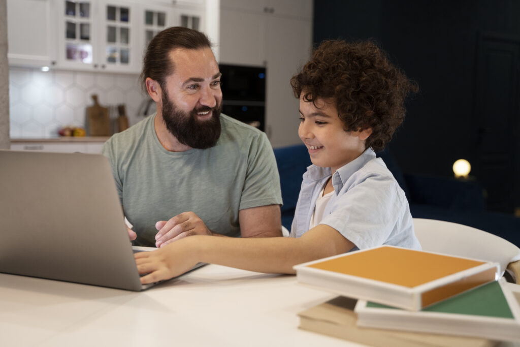 Parent and child smiling while practicing the best study habits for elementary students